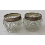 A pair of silver rimmed glass salts. Hallmarked Henry Perkins & Sons, London, 1918.