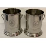 A pair of circular 2 handled Louis Roederer champagne coolers with engraved detail to front.
