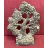 A hollow bronze figurine of a Chinese coin tree.