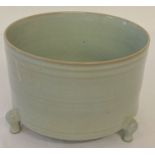 A large pale blue glaze circular ceramic pot/censer.