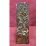 A small Chinese bronze seal featuring Cherry blossom tree detail.
