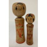 2 vintage wooden Japanese Kokeshi dolls, both with signatures to underside.