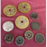 A collection of 10 Chinese coins to include Ban Liang style coins with central square shaped hole.