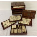 A vintage bamboo and bone Mah-jong set in brass bound 5 drawer cabinet.