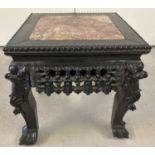 A Chinese carved hardwood square topped plant stand.