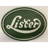 An oval shaped green and white painted cast iron "Lister" wall hanging plaque.