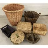 7 vintage and modern wicker and willow baskets.
