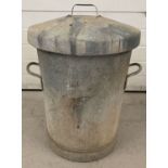 A vintage galvanised dustbin with lid. Stamped 722 with kite mark.