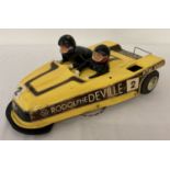 A vintage Tamiya B2B racing sidecar in yellow colourway.