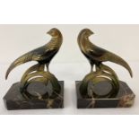 A pair of Art Deco marble and spelter bookends.