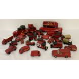 A collection of 25+ diecast model vehicles and post boxes relating to the Royal Mail.