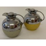 A pair of vintage painted brass and chrome bulbous shaped flasks by Thermos.