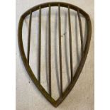 A large cast iron shield shape corner hay rack.