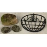 A set of 3 concrete hedgehog garden ornaments together with a black wall mounted handing basket.