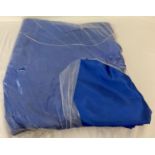 A bolt of silk feel polyester satin material in Royal Blue colour.