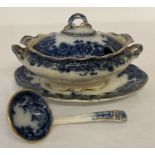 A Victorian "Flourence" pattern blue and white ceramic lidded sauce tureen with gilt detail.