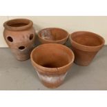 A shaped terracotta strawberry plant pot together with 3 medium sized terracotta plant pots.