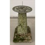 A vintage concrete sundial garden ornament with cockerel detail to metal sundial.