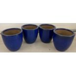 4 matching blue glaze ceramic garden planter pots.