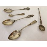 A collection of British and continental silver spoons. To include both decorative and plain.