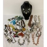 A collection of costume jewellery statement necklaces in varying lengths and styles.