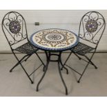 A modern wrought iron garden patio bistro set with mosaic detail.