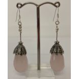 A pair of silver and rose quartz drop earrings set with marcasite's.