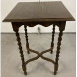 A vintage oak square topped small side table with barley twist legs and shaped stretchers.