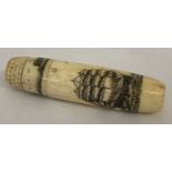 A carved bone, scrimshaw style needle case with screw on thimble lid.