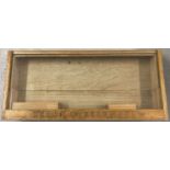 A vintage "Henri Wintermans" cigar counter top display case with slide out glass front.