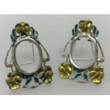 A pair of Art Nouveau style, 925 silver, miniature picture frames with enamelled flower detail.