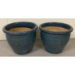 2 blue glazed garden plant pots.