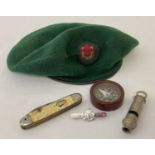 A vintage green Boy Scouts beret together with a "The Emea" Boy Scouts whistle, a Pathfinder "Major"