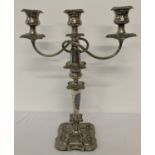 A large, heavy silver plated 2 sectional 3 branch candelabra.