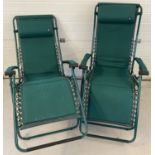 2 modern aluminium framed sun lounger garden chairs by Lafuma.