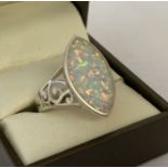 A 925 silver and opalite ring with pierced work detail to shoulders and mount.