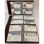 3 large albums containing a quantity of first day covers, dating from 1989 to 2003.