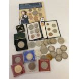 A box of assorted vintage coins.