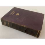 A leather bound 1st edition of "A Modern Comedy" by John Galsworthy.