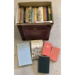 A box of vintage books relating to country life and places around Britain.