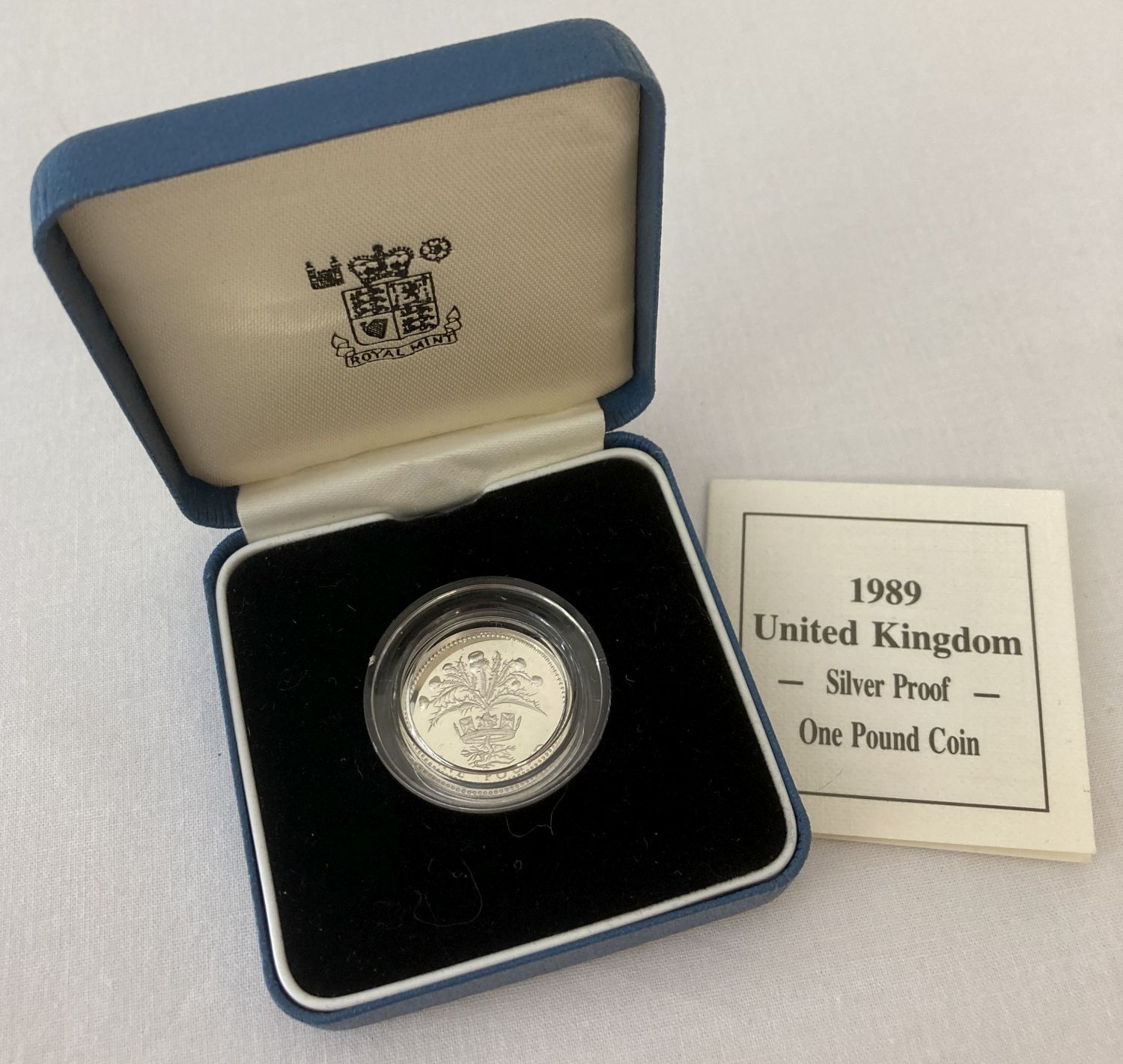 A boxed English 925 silver £1 coin dated 1989 with COA.