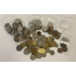 A collection of foreign vintage coins from France, Canada, Ireland, Belgium, Malaysia and India.