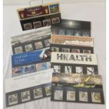 8 Royal Mail collectors stamp sets, with information cards.