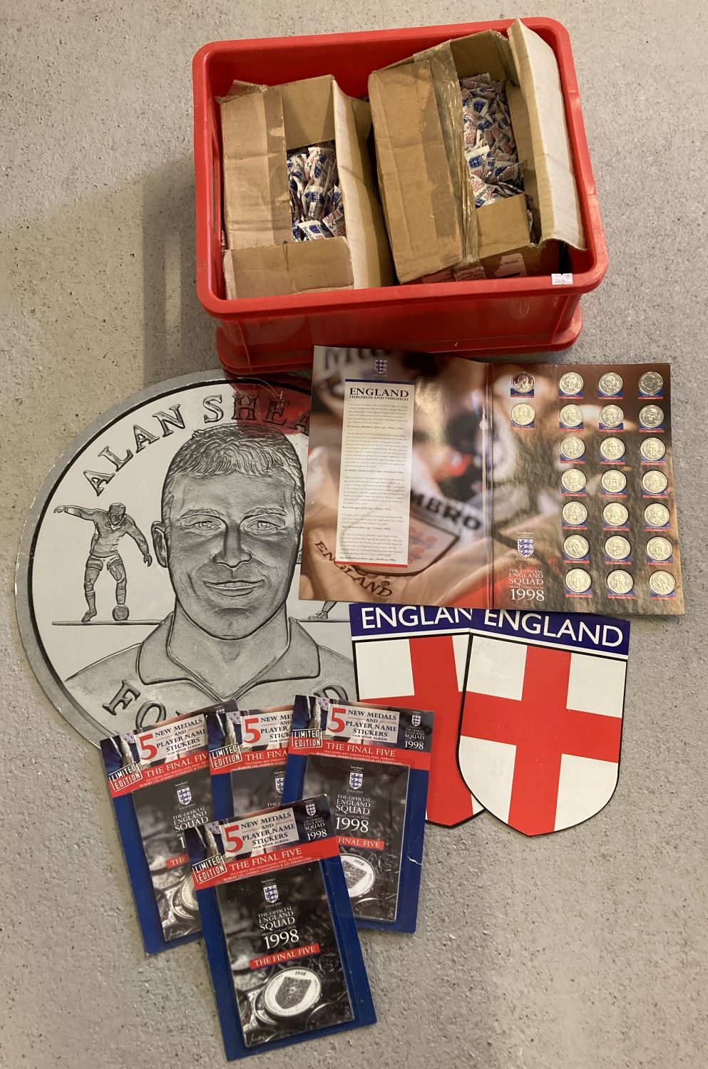 A large quantity of un-opened Sainsbury's 1998 World Cup collectors coins.