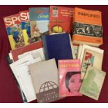 A collection of assorted vintage ephemera to include: stamps, postcards and pamphlets.