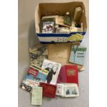 A box of assorted vintage ephemera.