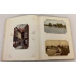 A postcard album containing postcards relating to Norfolk. To include rp's and hand tinted.