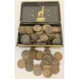 A vintage metal cash tin by "Giraffe" containing 250+ pennies and half pennies.