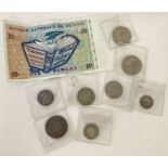 A collection of American and European coins. Together with a Tunisian 10 Dinar bank note.