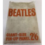 Original 1960's magazine bag advertising a giant size pin-up panel of The Beatles.